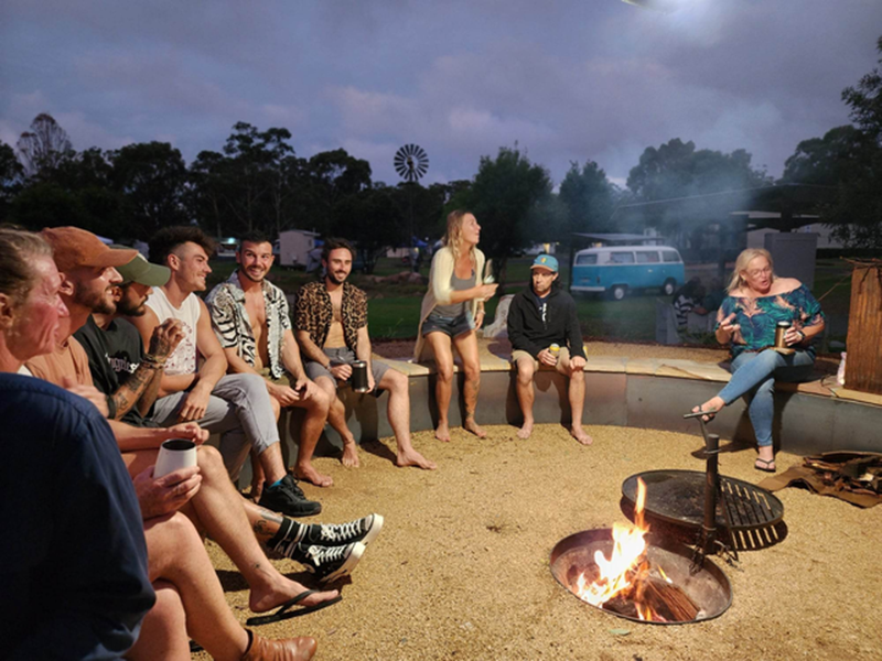 Group of people around fire pit